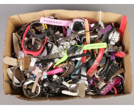 A large collection of wristwatches including Sekonda, Fossil, Umbro, Timex etc