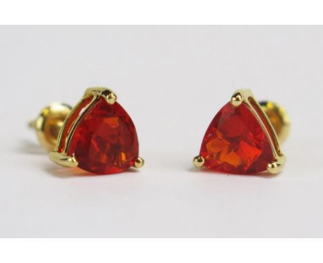 A Pair of 18K Gold and Fire Opal Stud Earrings, screw back stamped 18K, 1.44g