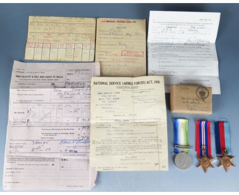 World War Two group of three to K. R. Parnell, includes 1939-45 Star, Atlantic Star and War Medal, in original box of issue w