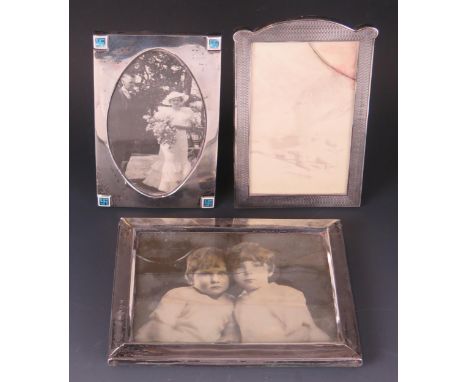 A George V silver and enamel photograph frame, maker Horton &amp; Allday, Birmingham, 1916, of rectangular outline, the corne