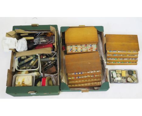 A collection of assorted watchmaking equipment including tools. rounding bar sets, battery tester, fret saw etc.