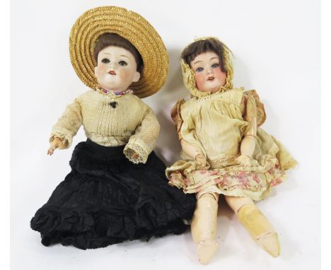 Armand Marseille, a bisque head doll, impressed Germany, 390, A2M, with brown mohair wig, weighted blue eyes, open mouth with