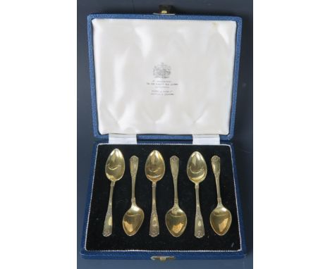 A set of six Elizabeth II silver gilt coffee spoons, maker Mappin &amp; Webb, Sheffield, 1957, cased, 66gms, 2.13ozs
