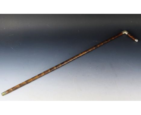 An Edward VII novelty silver mounted walking stick, maker Maria Johnson, London, 1904, the handle concealing a sterling silve