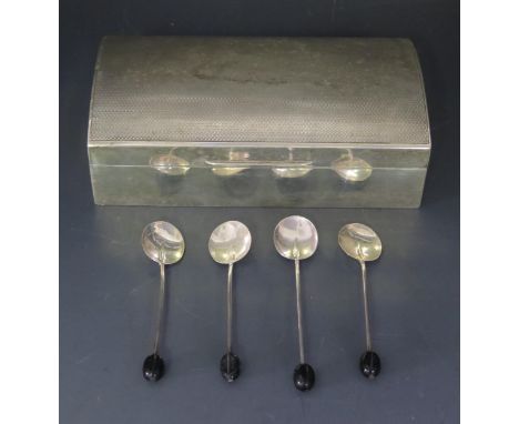 A George V silver cigarette box, maker Adie Bros Ltd, Birmingham, 1924, of rectangular outline with wood lined interior and e