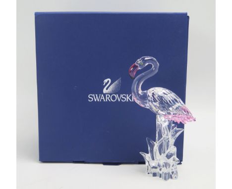 A Swarovski crystal model of a flamingo, 15.5cm high, boxed.