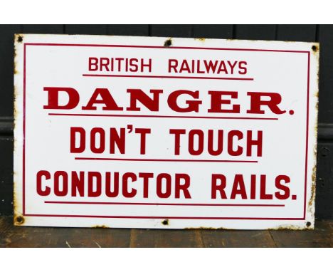 A British Rail enamel sign 'Danger Don't Touch Conductor Rails', 51cm wide.