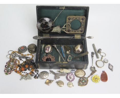 A Jewellery Box and Contents including yellow metal lockets, a marcasite inlaid eagle brooch, gilt lorgnette, etc.