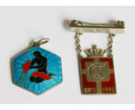 A Georg Jensen Commemorative Badge designed for the 70th birthday of King Christian X of Denmark by Arno Malinowski and worn 