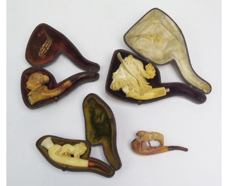 A meerschaum pipe, the bowl in the form of a bust of a cavalier, cased, together with three other pipes.