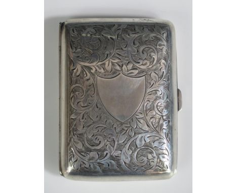 A George v silver cigarette case, maker Henry Williamson Ltd, Birmingham, 1913, with chased foliate and scroll decoration, 8c