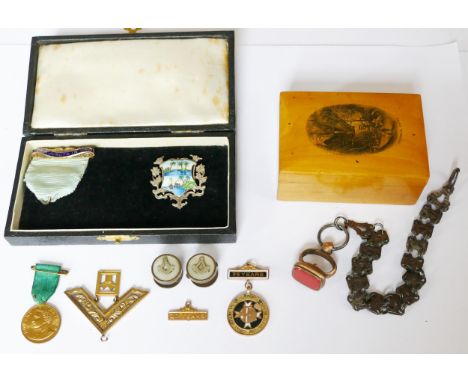 A G.W.R. 9ct Gold 25 Years First Aid Efficiency Medallion  with 3% year bar (9g) Georgian steel chain with gilt fob seal, Mas