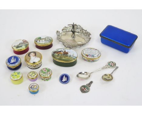 A collection of modern enamel patch boxes, mostly by Halcyon Days, a silver ring tree and silver spoons.