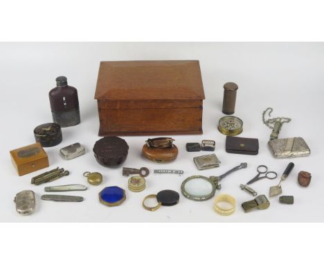 A box of assorted collectables including Mauchline ware, Vesta case, lighter, magnifying glass etc.
