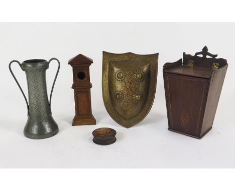 A mahogany and inlaid candle box, 30cm high, an Art Nouveau beaten pewter twin handled vase, 27cm high, a copper and enamel s