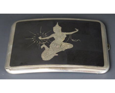 A Sterling silver and niello decorated cigarette case, decorated with an exotic dancer, 10.5cm wide, 105gms, 3.39ozs