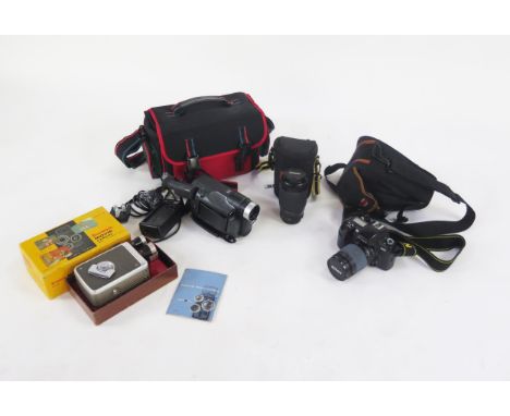 Nikon F60 Camera Body with 28-80mm and 75-240mm AF Nikkor Lenses together with JVC VHS Camera, Kodak Brownie No. 84 Movie Cam