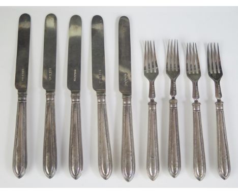 A set of five Victorian silver fruit knives and four matching forks, maker Harrison Brothers &amp; Howson, Sheffield, 1875, w
