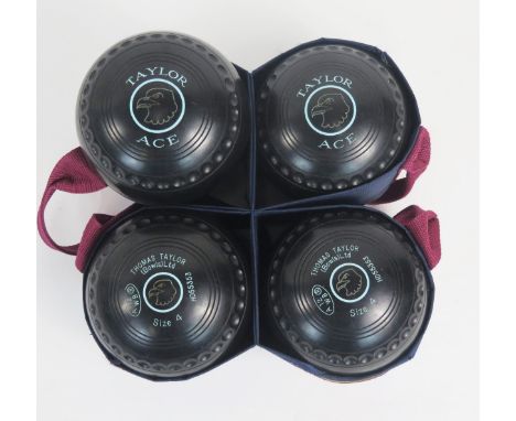 A set of four Thomas Taylor bowls Ltd,  lawn bowls size 4, (A 12 /WB R)