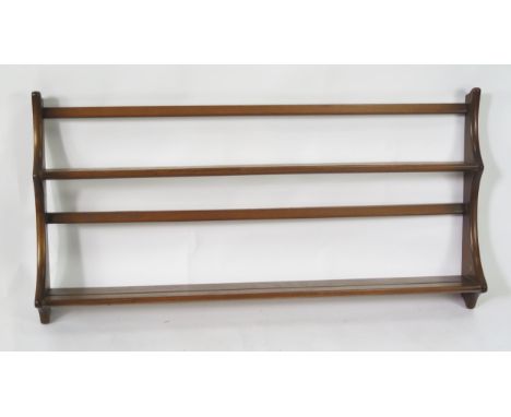 An Ercol Elm Plate Rack, 97(w)x50(h) cm