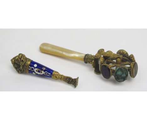A 19th Century gilt metal Spinning Wax Seal set with six onyx and paste matrices engraved with the days of the week, (one mis