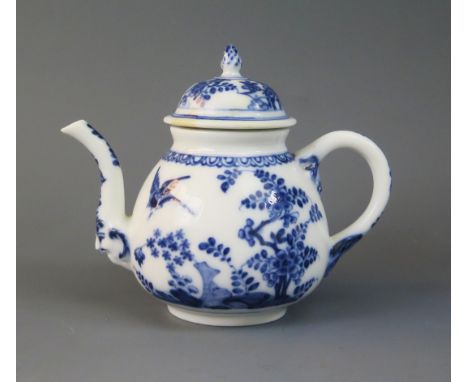 A Meissen porcelain bachelors teapot, of globular form, the cover with pineapple finial, having blue and white bird and folia