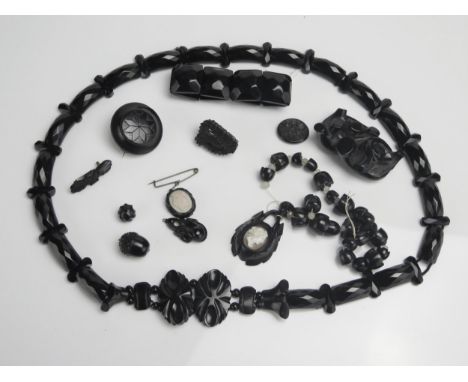 A Selection of Victorian Jet Jewellery including a c. 85cm necklace and an Irish bog oak harp brooch 