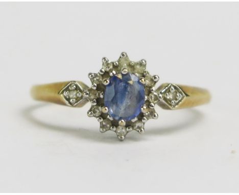A 9ct Gold, Tanzanite and Diamond Cluster Ring, size R.5, hallmarked, 1.83g
