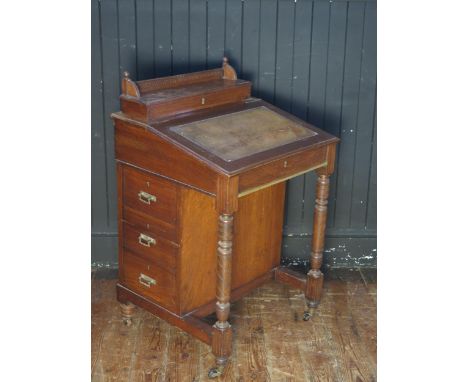 An Edwardian Mahogany Davenport and a demi lune card table 