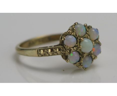 A 9ct Gold and Opal Cluster Ring, 11.1mm head, size L, stamped 9CT GOLD, 2.14g