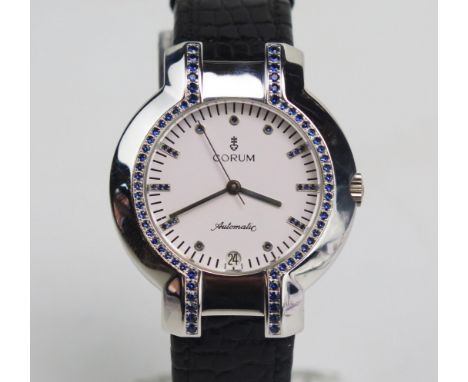 A CORUM 18K White Gold and Sapphire Automatic Wristwatch, c. 36.3mm case., back no's 82.284.69 567175 (marks rubbed, so this 