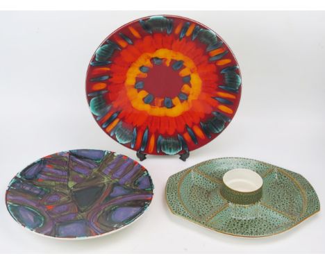 A Poole pottery four division serving platter with central dipping dish, 39cm diameter, a large Poole Pottery charger with Vo