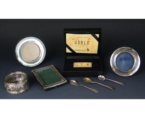 A Silver ingot 'Leaning tower of Pisa' stamped 800, three silver photograph frames, napkin ring, salt spoons, weighable silve