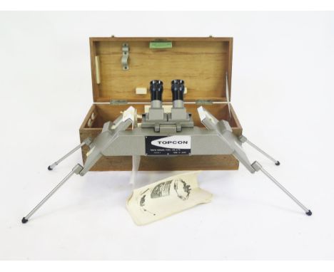 A Topcon mirror stereoscope, contained in a fitted case.