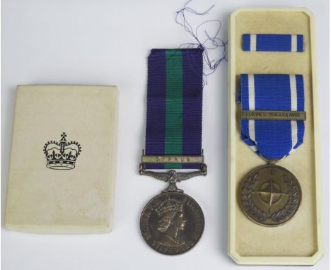 An Elizabeth II General Service Medal to 23268947. Sgt. W. K. Robinson, R.E.M.E. with Cyprus clasp, in original box of issue,