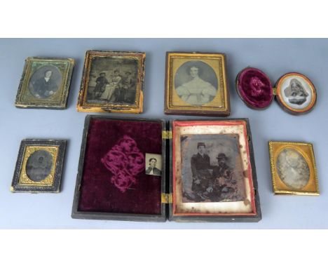 A 19th century oval ambrotype, contained in a Carton Pierre case, together with other ambrotypes and daguerreotype, various s