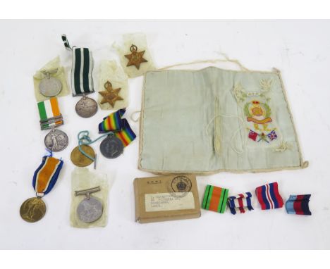 A Kings South Africa Medal to 5069. Gnr. P. Kavanagh. R.G.A. with 1901 and 1902 clasps, a World War One pair to 430256.  Spr.