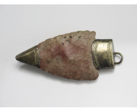 A Stone Age and Victorian Arrow Head Pendant with Brooch Mount in a 15ct gold setting, 57.7mm drop, 13.05g.