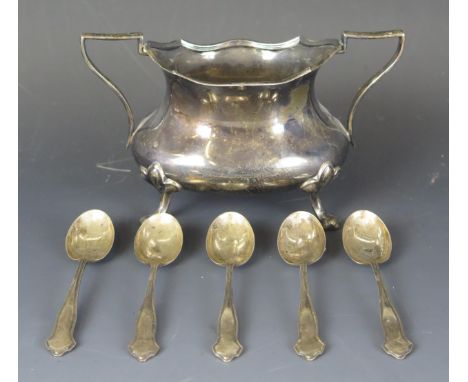 A George V silver sugar basin, maker Cooper Brothers &amp; Sons Ltd, Sheffield, 1923, with twin loop handles raised on four s