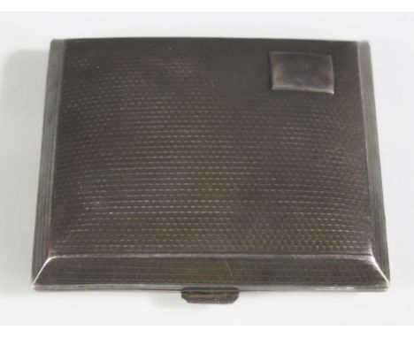 A George V silver cigarette case, maker John Henry Wynn, Birmingham, 1928, of rectangular outline with engine turned decorati