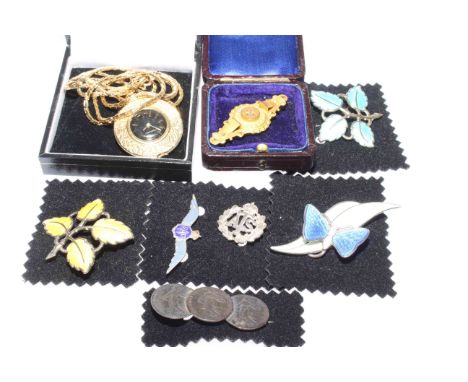 Victorian 9 carat gold die-stamped brooch, enamel brooches, RAF and other brooches and a fob watch