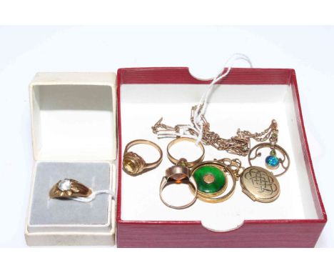 Two gold pendants, one with 18 carat gold and green enamel centre, locket pendant and four gold rings