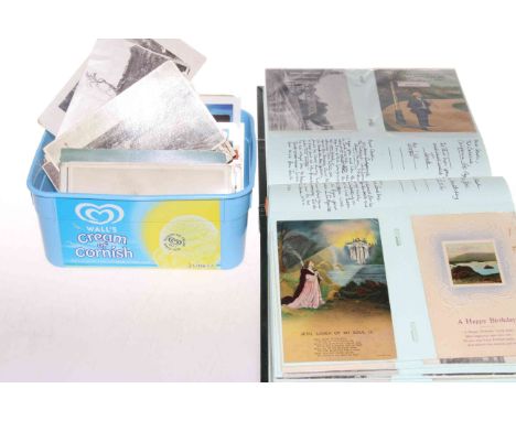Album and box of vintage postcards