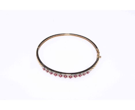 9 carat gold bangle set with rubies
