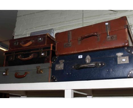 Five assorted vintage suitcases