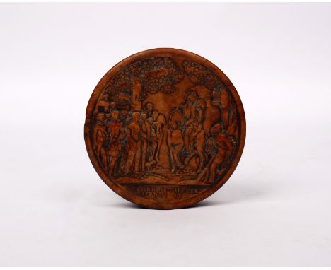 A fruit wood table top snuff box with lacquered interior and carved top with inscription 'Retour de Chasse d' Henri IV' 