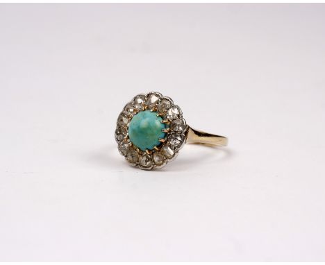 A Victorian 18ct gold turquoise and diamond dress ring, central turquoise cabochon with a surround of 14 old cut diamonds. Si