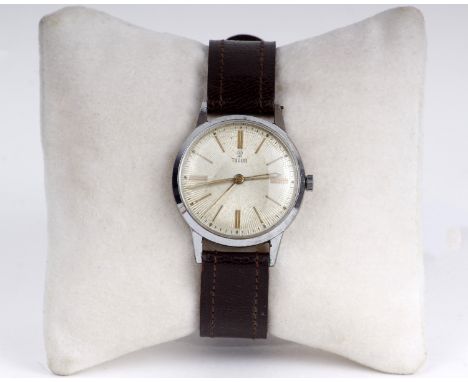 A mid century Gentleman's Tudor Rolex wrist watch. Stainless steel 32mm case with gold face and baton markers. Manual wind mo