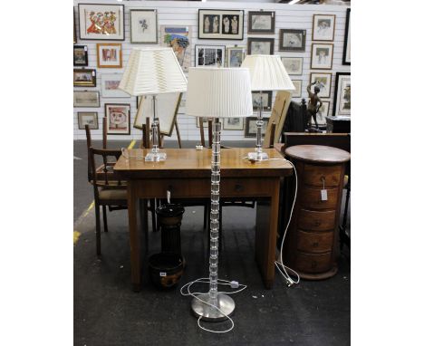 A modern crystal column floor lamp plus 2 x matching table lamps with matching shades in cream