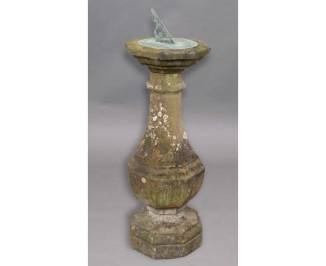 SANDSTONE BALUSTER PEDESTAL, mounted with a sundial, total height 124cm